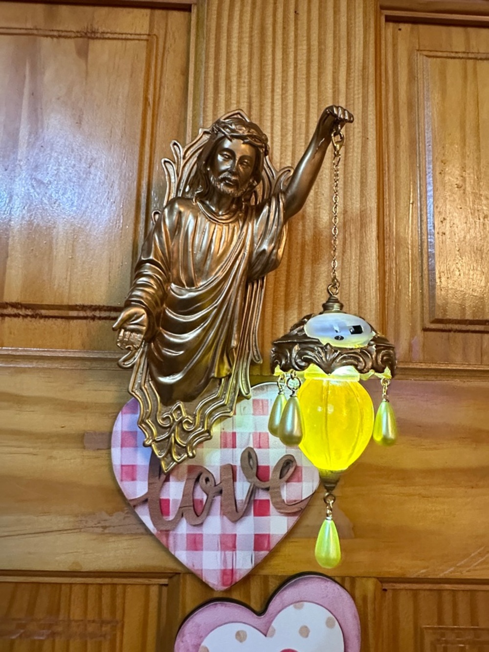 Gold-Tone Decorative Wall Hanging with Yellow Glass Lantern